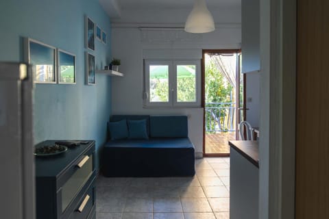 Bed, Living room, Seating area, Bedroom