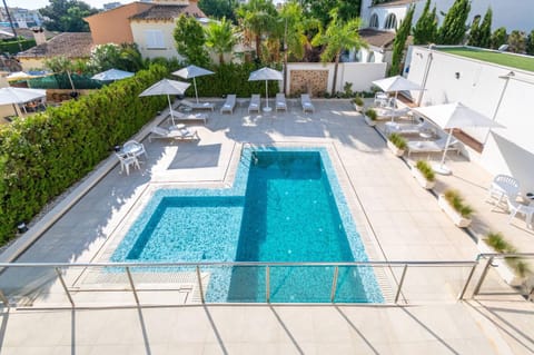 Property building, Living room, Swimming pool