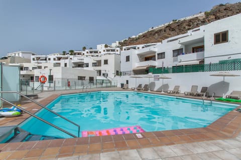 Property building, Living room, Swimming pool