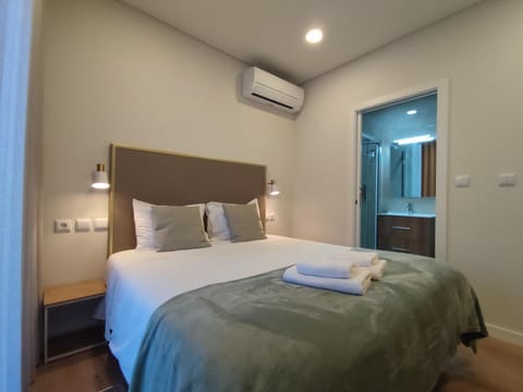 Bed, Photo of the whole room, Bedroom, towels, air conditioner