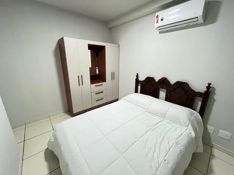 Bed, wardrobe, air conditioner