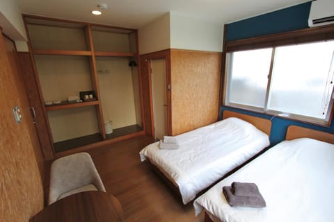 Bed, towels, air conditioner