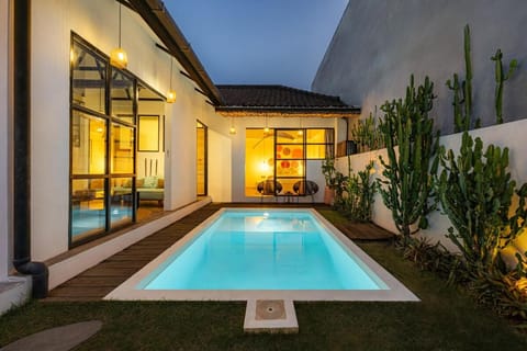 Property building, Patio, Night, Garden, Garden view, Pool view, Swimming pool
