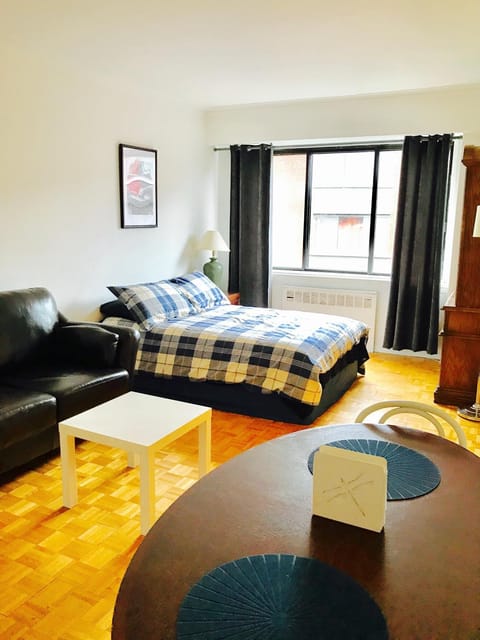 Bed, Living room, Seating area, Bedroom