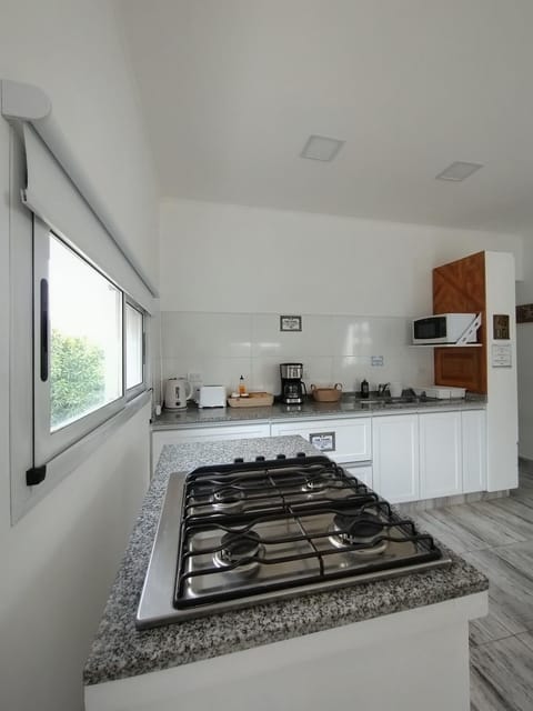 Kitchen or kitchenette, stove, kitchen