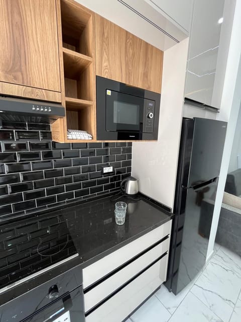 Kitchen or kitchenette, oven, stove