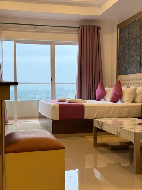 Bed, Living room, Seating area, Bedroom