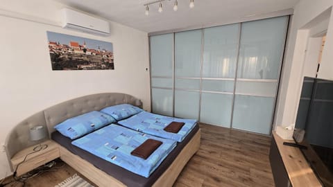 Bed, wardrobe, air conditioner