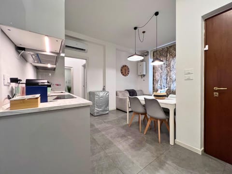 Kitchen or kitchenette, Dining area, oven, stove, air conditioner