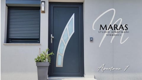 Property logo or sign, Text overlay, Inner courtyard view