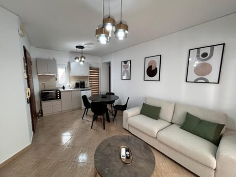 Kitchen or kitchenette, Living room, Seating area, Dining area