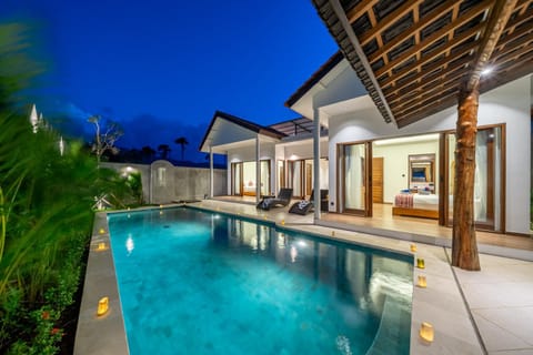 Property building, Patio, Night, Pool view, Swimming pool, sunbed