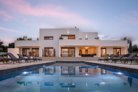 Property building, Patio, Pool view, Swimming pool, sunbed