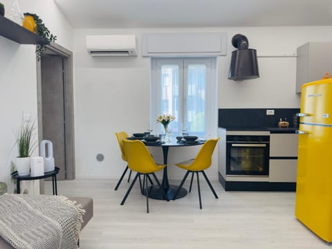 Kitchen or kitchenette, Seating area, Dining area, oven, stove, air conditioner