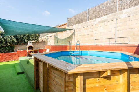 Property building, Living room, Swimming pool