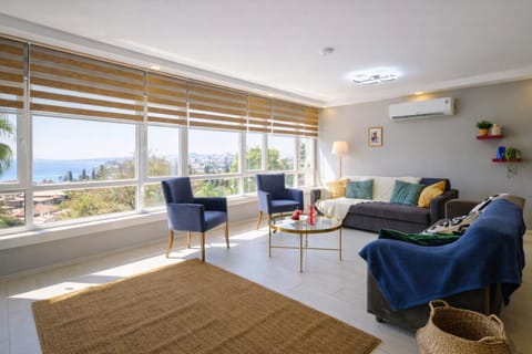 Natural landscape, Living room, Seating area, Sea view, air conditioner