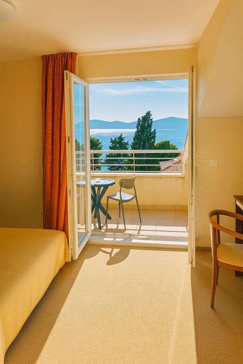 Natural landscape, View (from property/room), Bedroom, Sea view