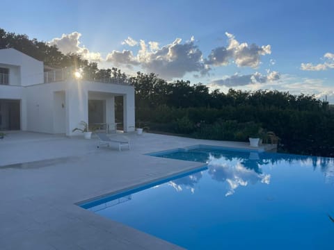 Property building, Day, Natural landscape, Pool view, sunbed