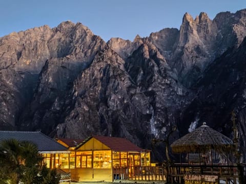 Property building, Nearby landmark, Natural landscape, Mountain view