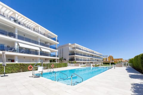 Property building, Living room, Swimming pool