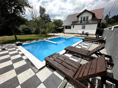 Property building, Pool view, Swimming pool, sunbed