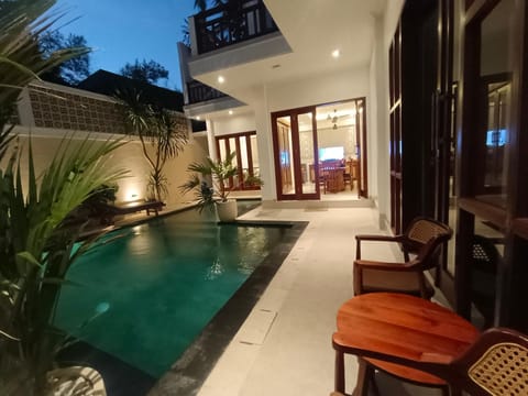 Property building, Patio, Night, Garden, Pool view, Swimming pool, sunbed