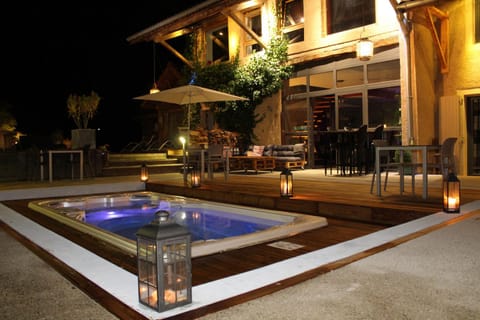 Property building, Patio, Night, Pool view, Swimming pool