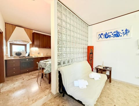 Bed, Kitchen or kitchenette, Dining area, towels