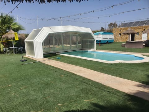 Property building, Living room, Swimming pool