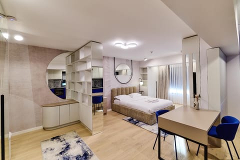 Bed, TV and multimedia, Kitchen or kitchenette, Living room, Photo of the whole room, Seating area, Bedroom