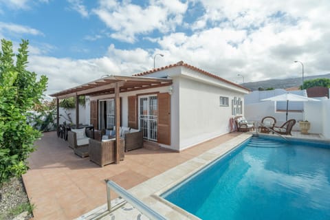 Property building, Living room, Swimming pool