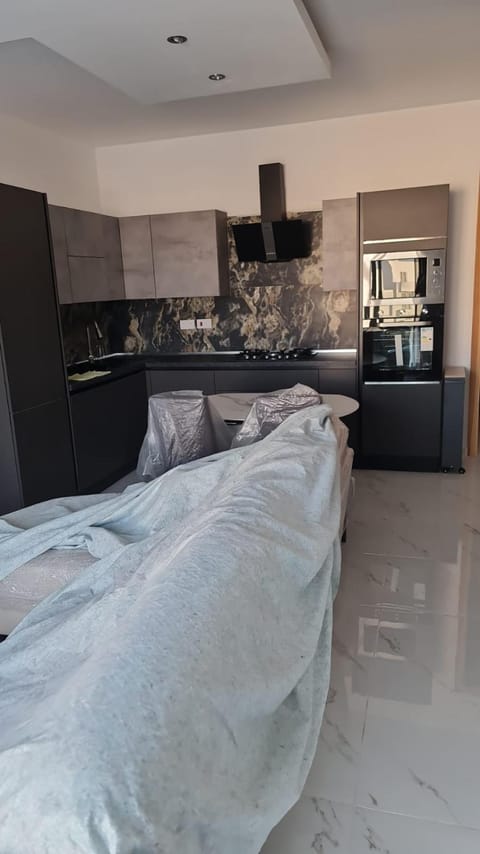 Kitchen or kitchenette, oven, stove