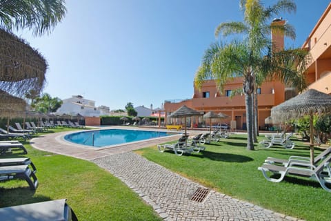 Property building, Living room, Swimming pool