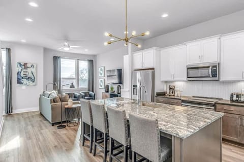 Kitchen or kitchenette, Living room, Seating area, dishwasher, microwave, oven, stove