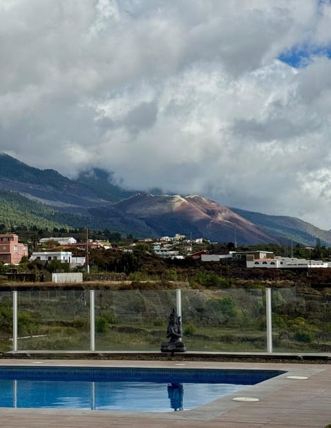 Property building, Natural landscape, Mountain view, Pool view, Swimming pool