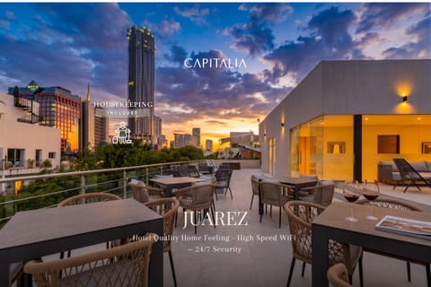 Property building, Day, Night, View (from property/room), Balcony/Terrace, Seating area, City view, Sunset