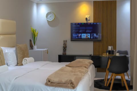 Bed, TV and multimedia, Bedroom, towels, air conditioner