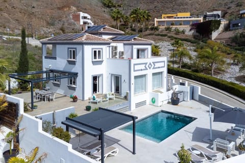Property building, Living room, Swimming pool