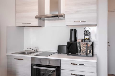 Kitchen or kitchenette, stove