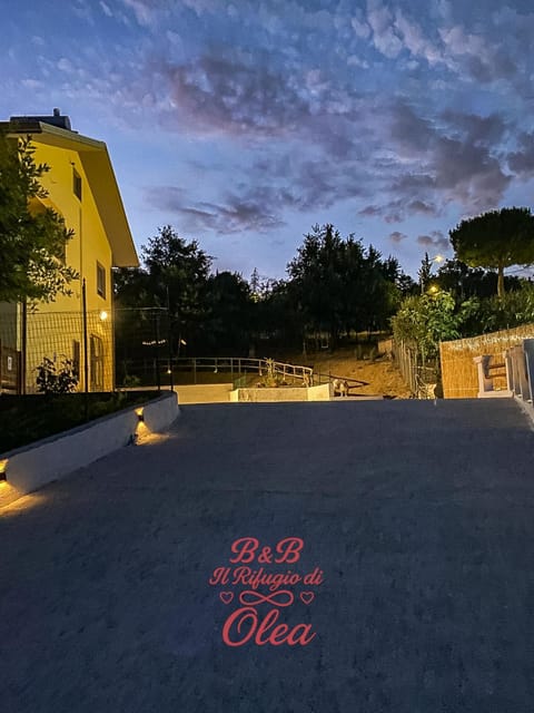 Property building, Night, Text overlay