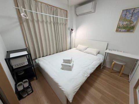 Bed, Photo of the whole room, Bedroom, towels, air conditioner