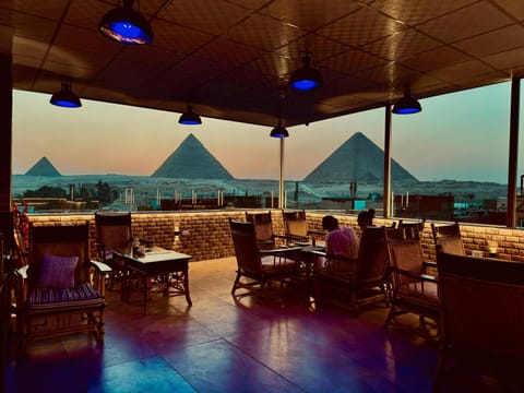 Nearby landmark, Restaurant/places to eat, View (from property/room), Balcony/Terrace, Landmark view, Sunset