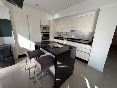 Kitchen or kitchenette, oven