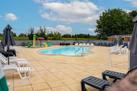 Property building, Living room, Swimming pool