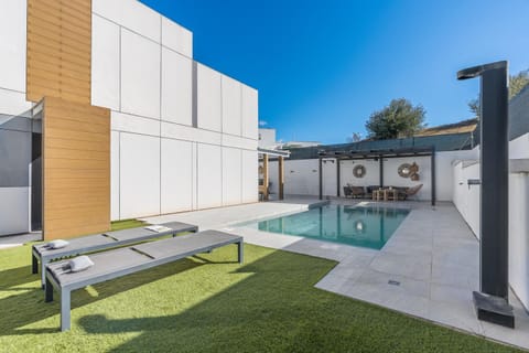 Property building, Living room, Swimming pool