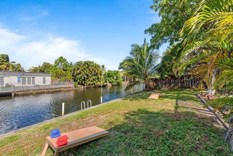 Canal views featuring indoor pool House in Oakland Park