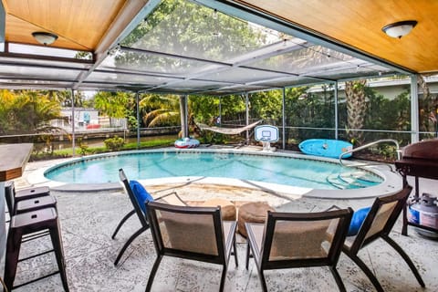 Canal views featuring indoor pool House in Oakland Park