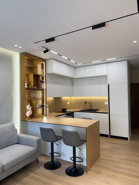Kitchen or kitchenette, Living room, Seating area, Dining area, minibar, oven, stove