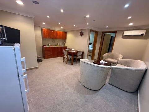TV and multimedia, Kitchen or kitchenette, Living room, Seating area, Dining area, air conditioner