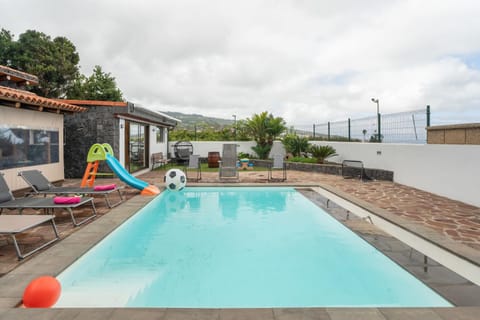 Property building, Living room, Swimming pool
